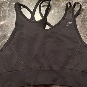Black strappy sports bra. Size large. Light to medium support. Worn once.